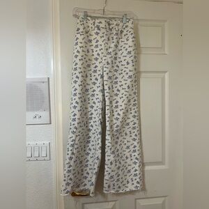 White and purple floral jeans